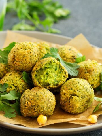 Traditional Egyptian food - falafel sprinkled with parsley and parmesan cheese.