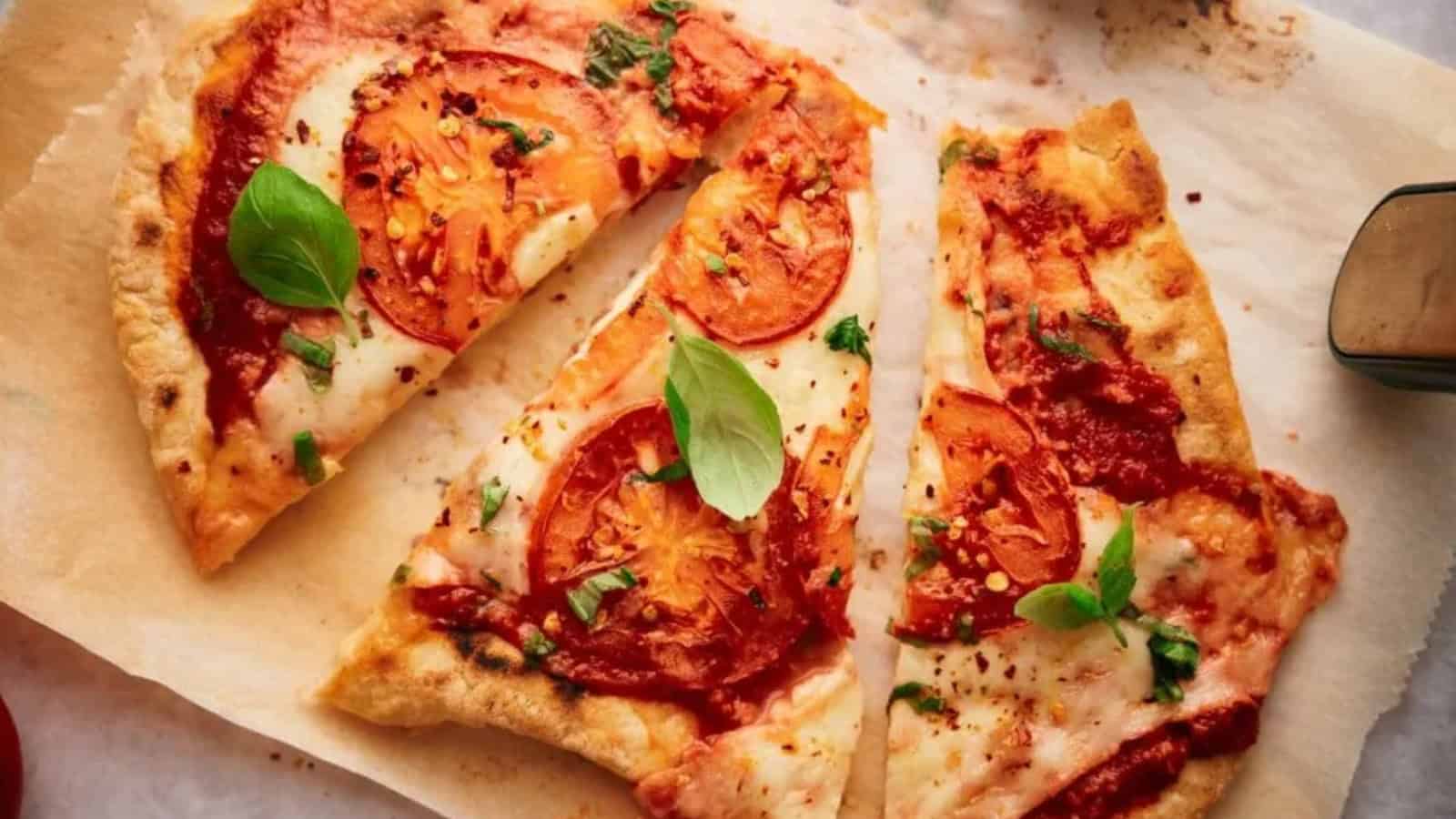 Two flatbread pizzas on a tray.