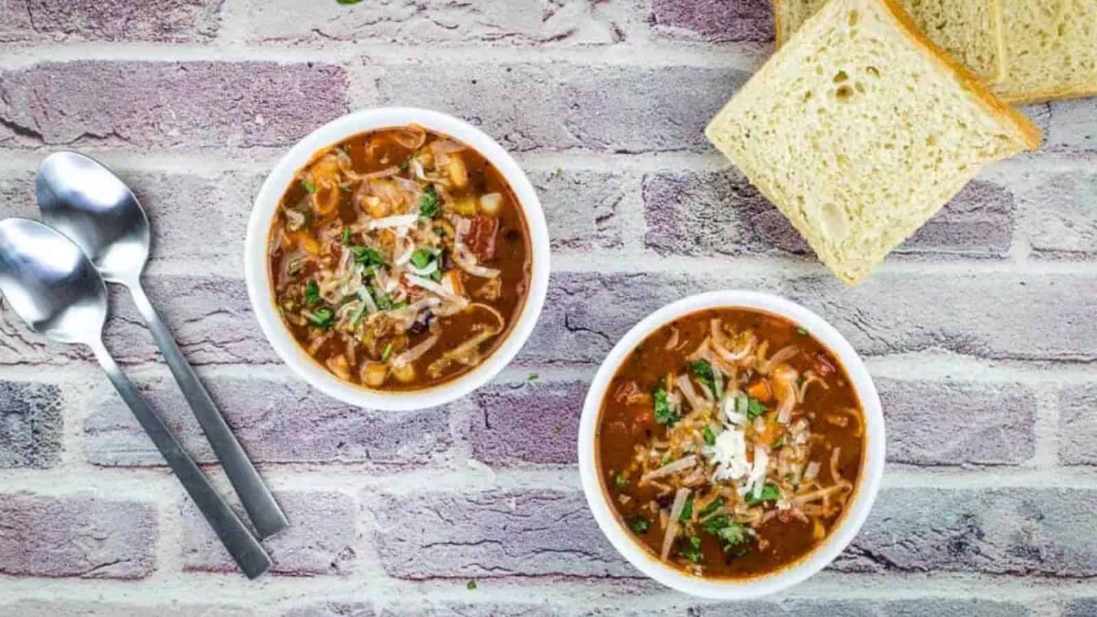 Pasta e Fagioli Soup in 2 bowls with spoons.