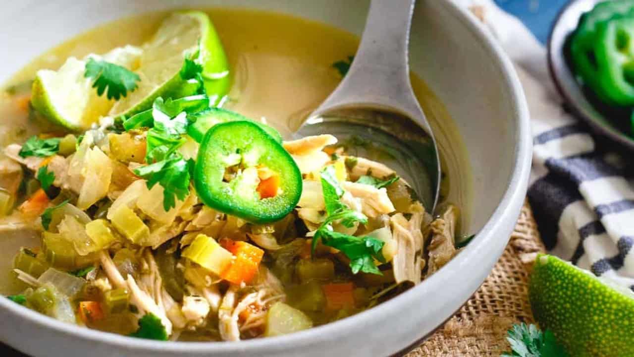Spicy chicken lime soup in bowls.