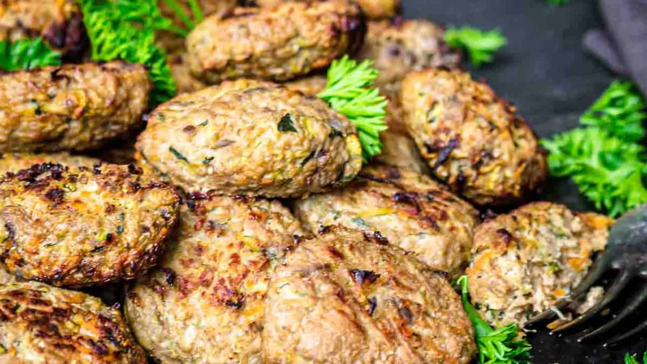 Mini burgers with parsley.