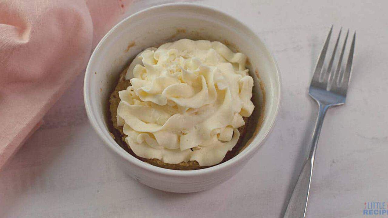 Cake mix mug cake with cream cheese frosting.