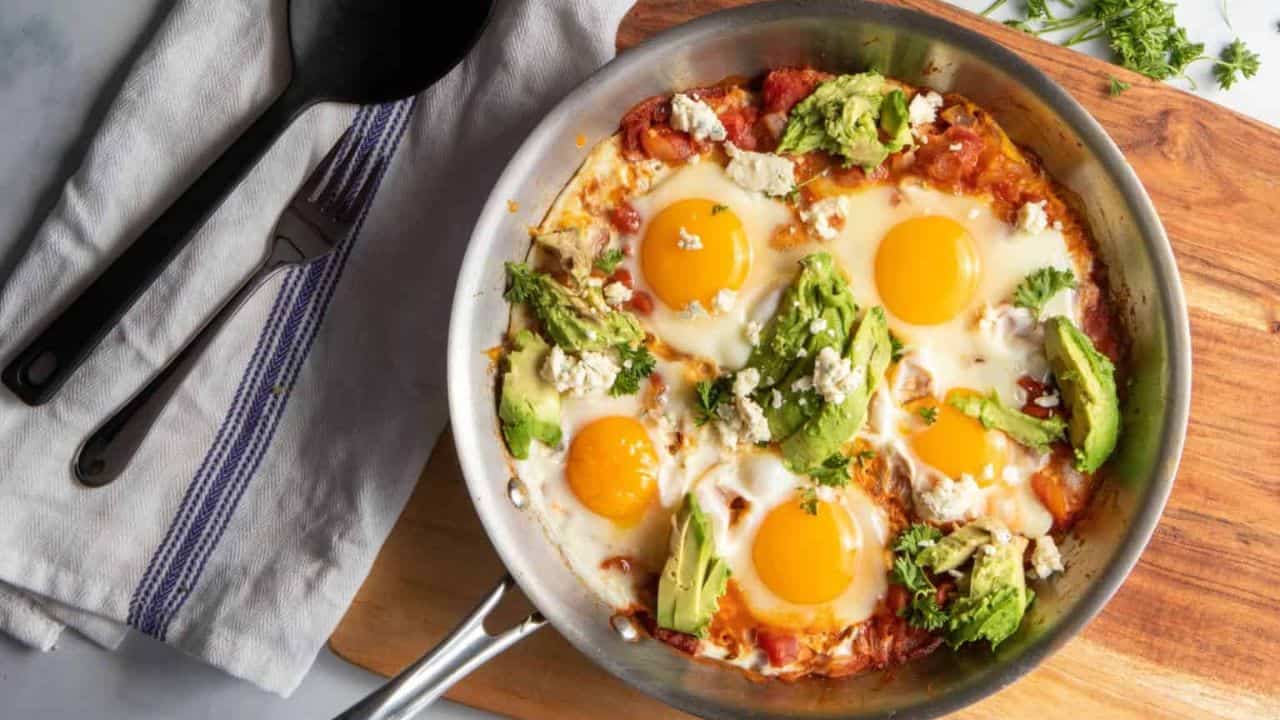 An overhead image of a cooked shakshuka in a pan.