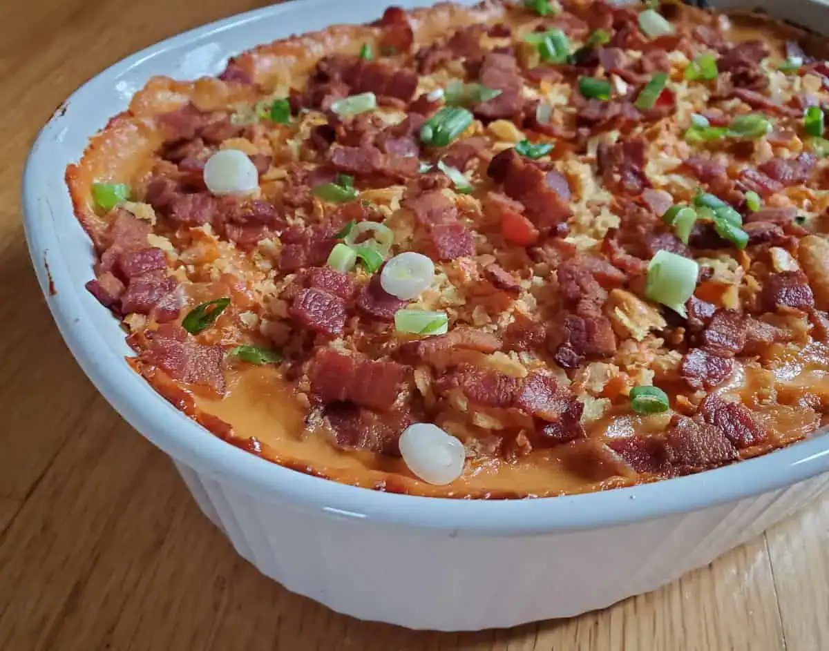 Overhead image of corn casserole in a white dish.
