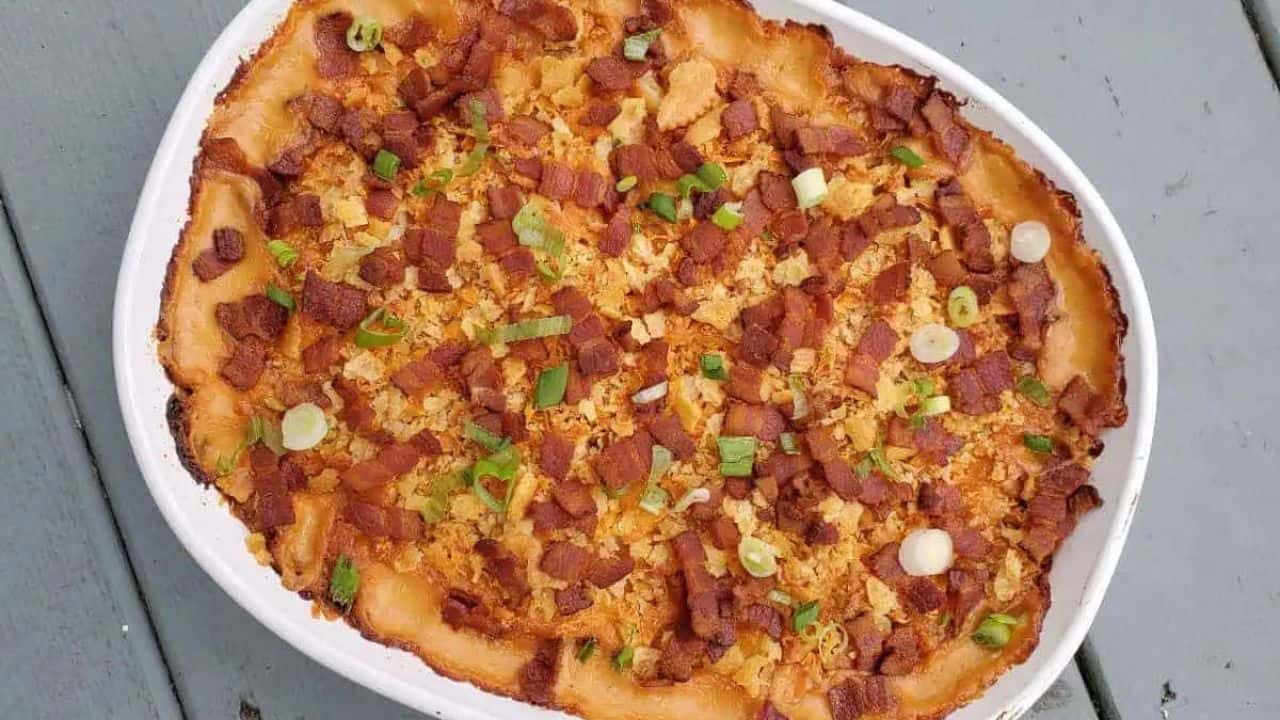Overhead image of corn casserole in a white dish.