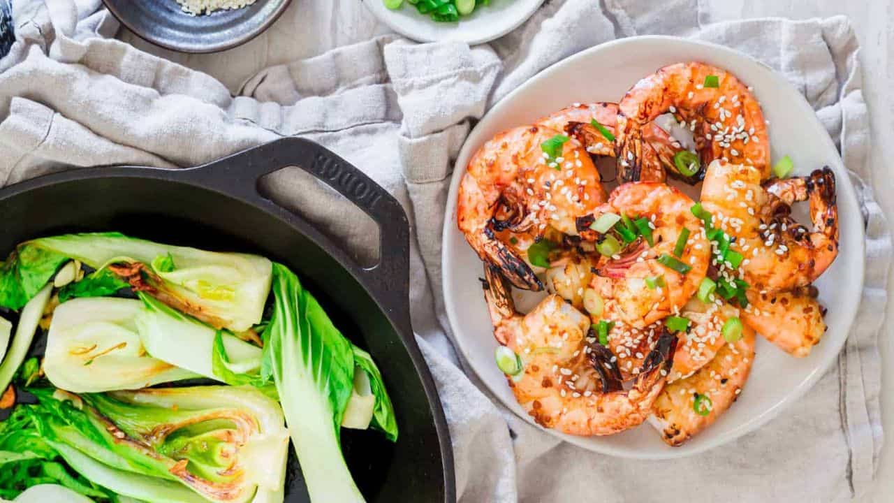 Garlic ginger shrimp on air fryer tray.