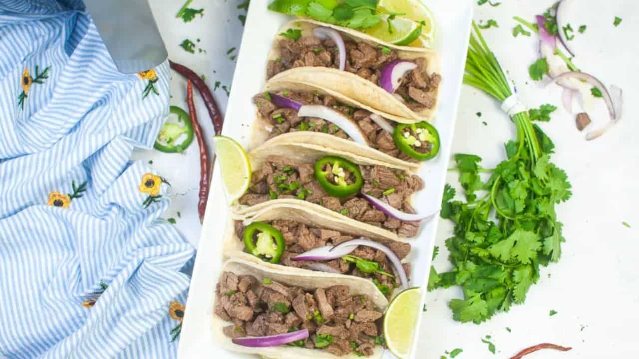 White plate with one taco.