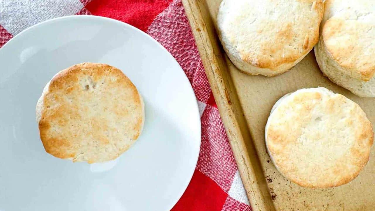 A biscuit with butter melting on it.