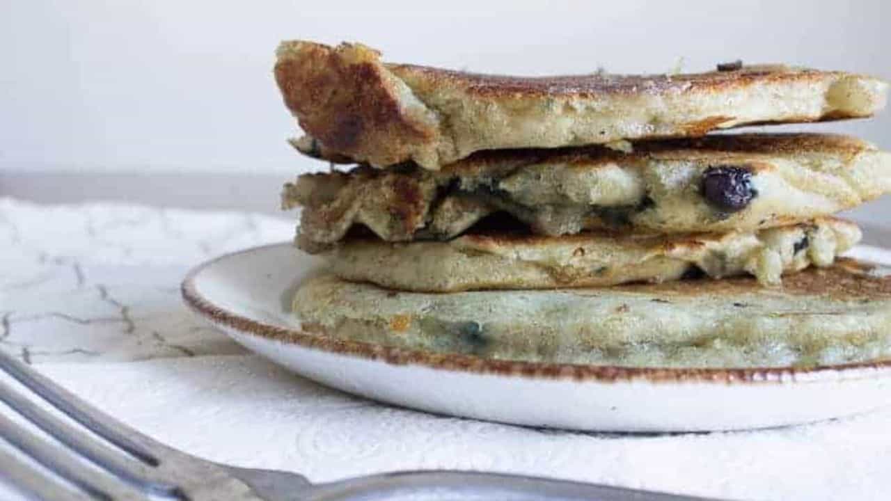 Stack of blueberry sourdough discard pancakes.