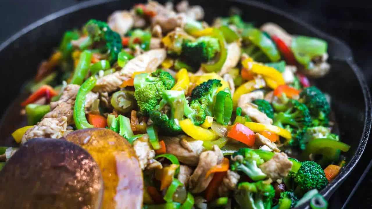 Broccoli Stir Fry with Chicken in a skillet.