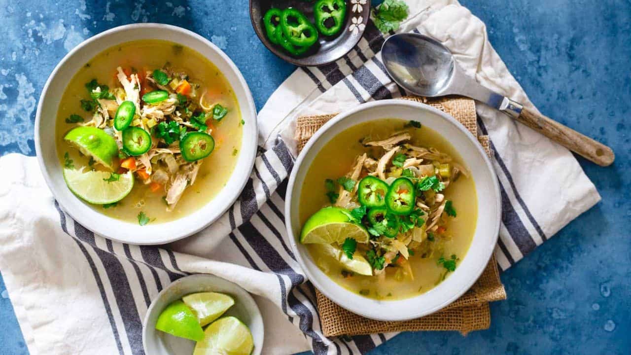 Spicy chicken lime soup in bowls.