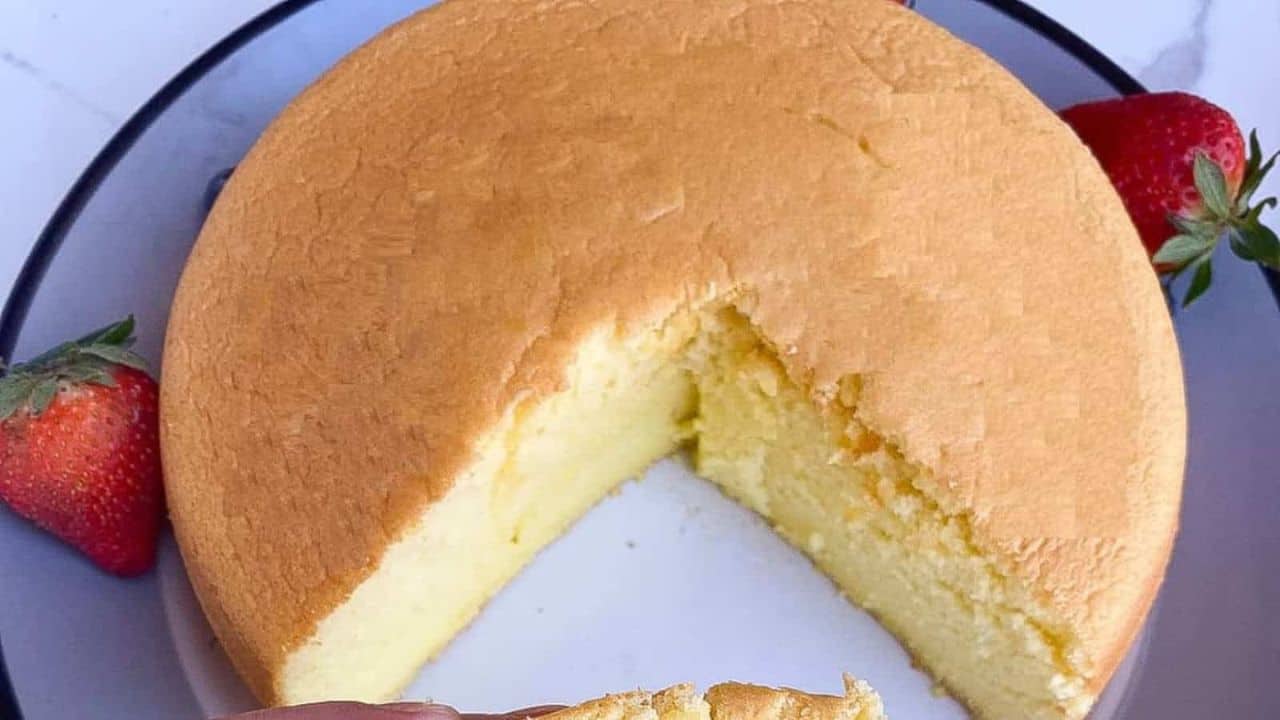 Light and airy Chinese sponge cake with a delicate, fluffy texture on a grey-white plate.