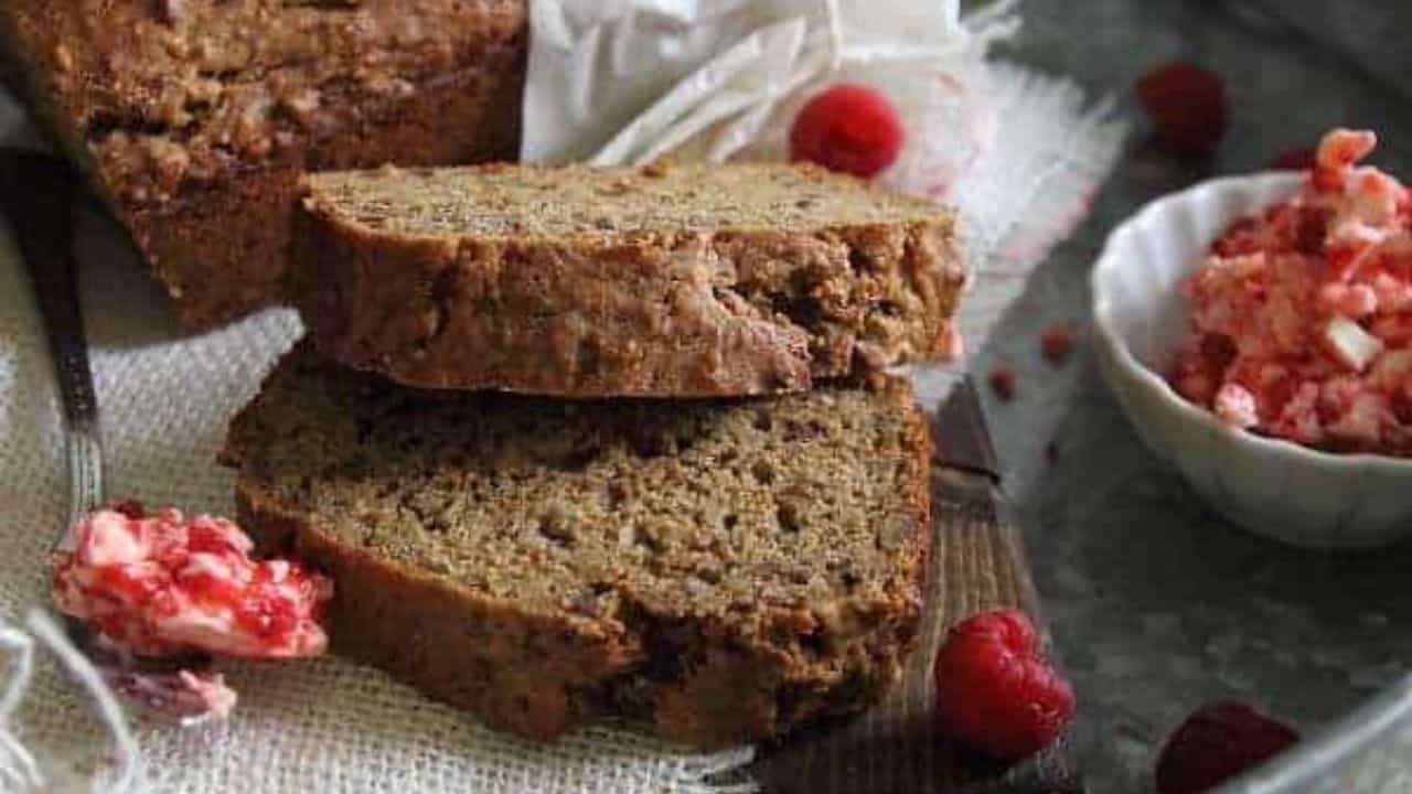 Cinnamon sugar banana pecan bread slices served with raspberry butter.