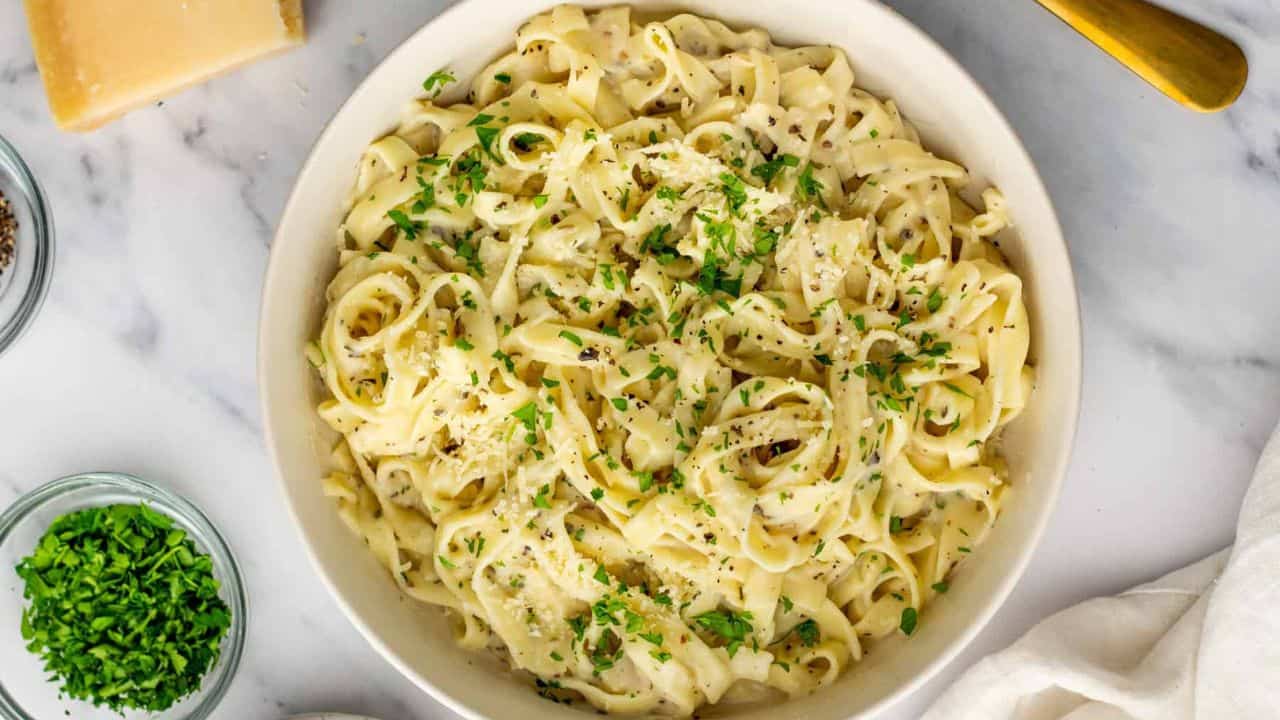 An overhead image of cottage cheese alfredo in a bowl.