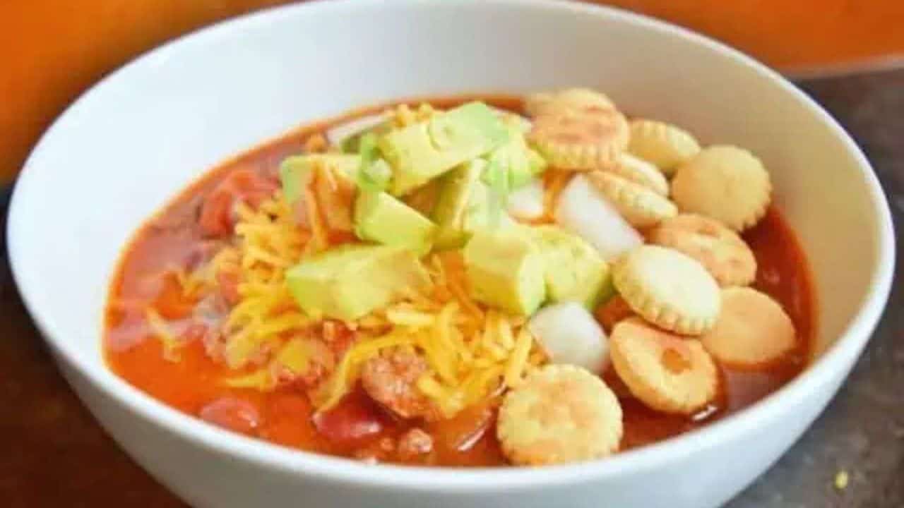 Image shows a closeup of a bowl of Crockpot beef chili.