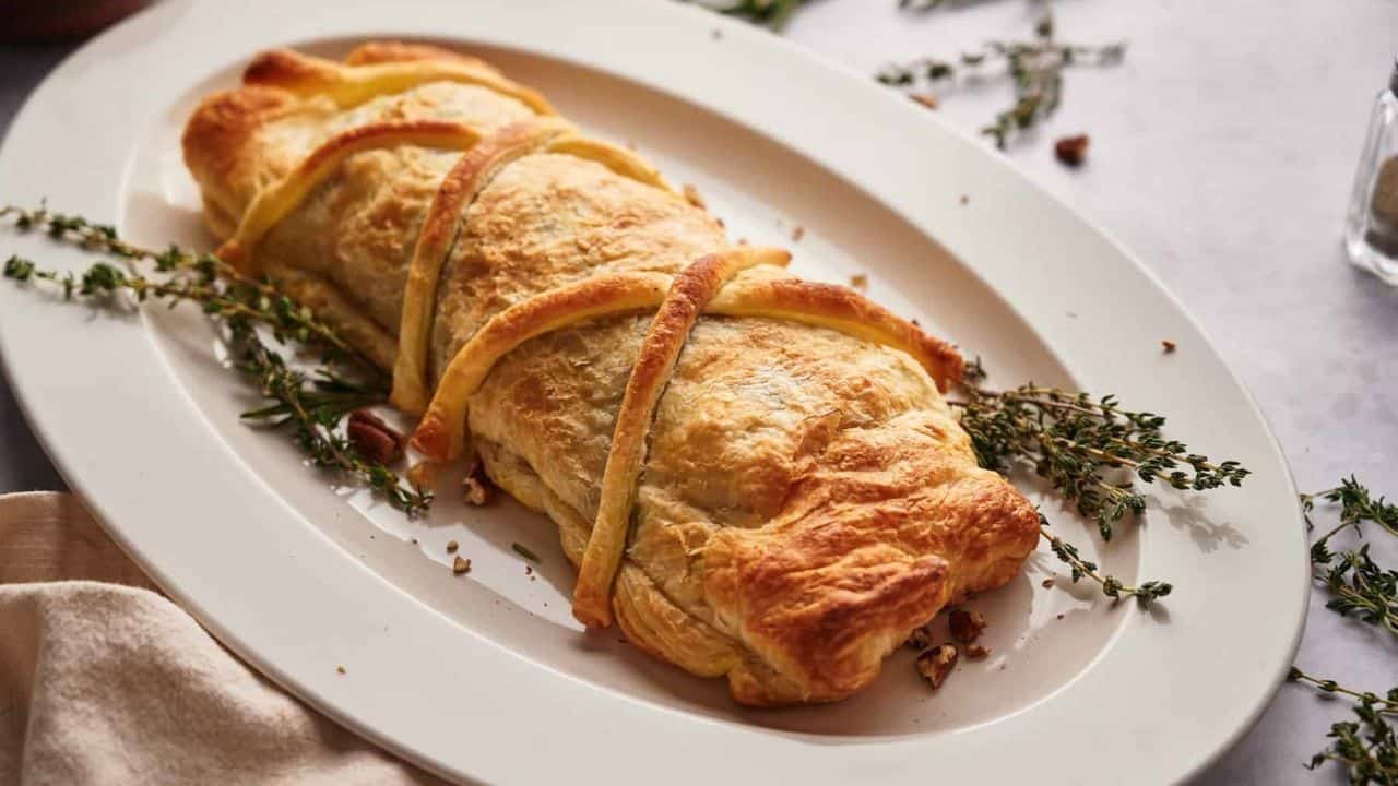 An overhead image of mushroom wellington in a serving plate.