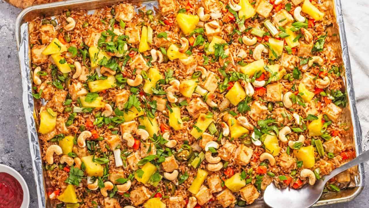 An image of pineapple fried rice on a plate.