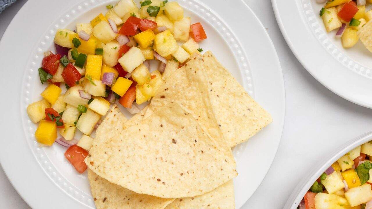Close-up image of pineapple mango salsa on a plate.