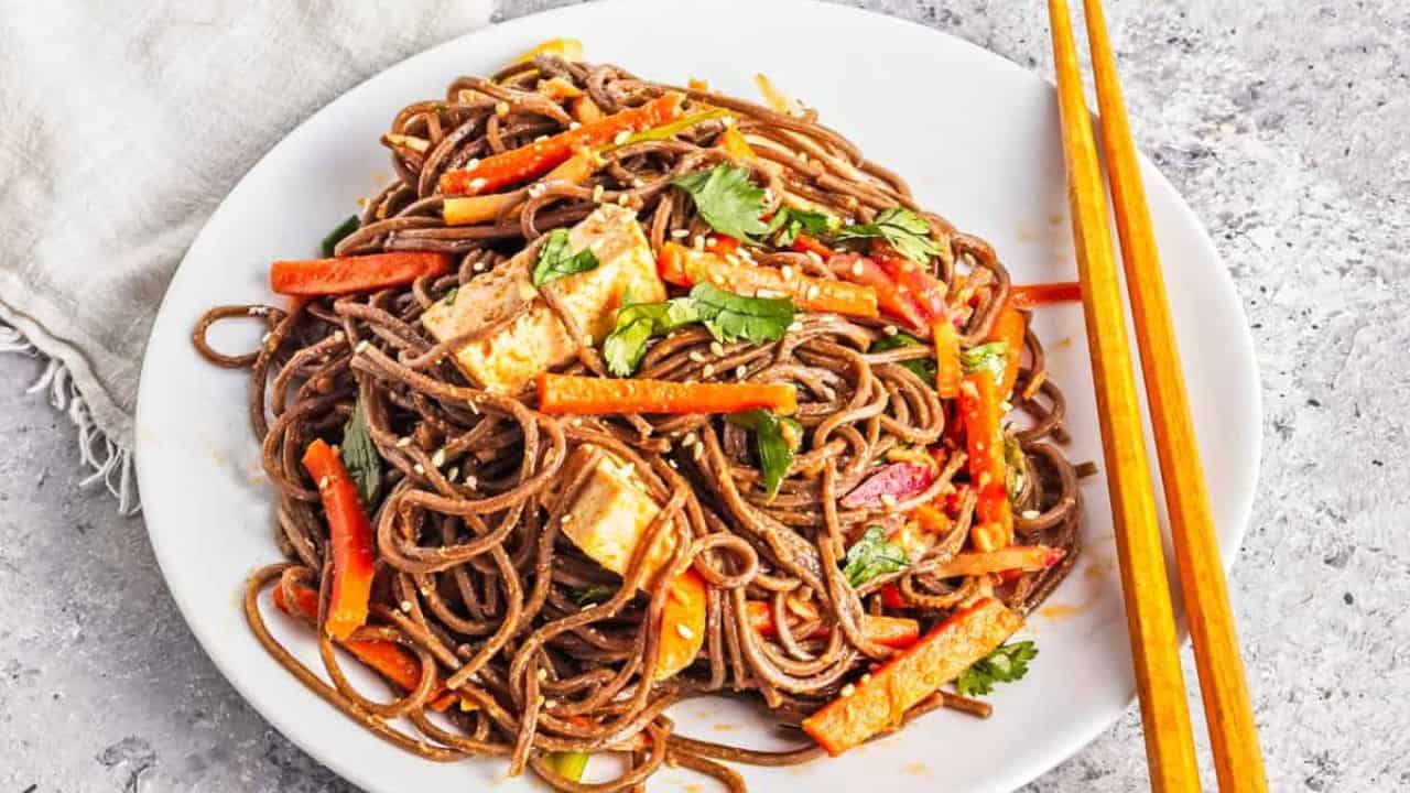 An overhead image of spicy soba noodles in a bowl.