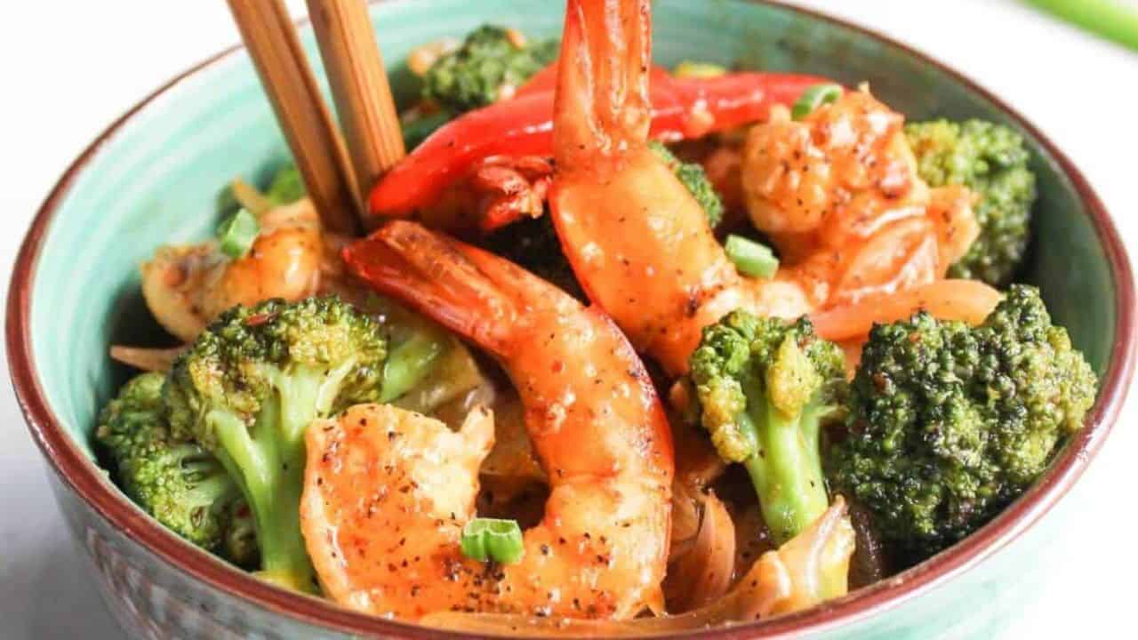 Shrimp and broccoli stir-fry in a bowl.