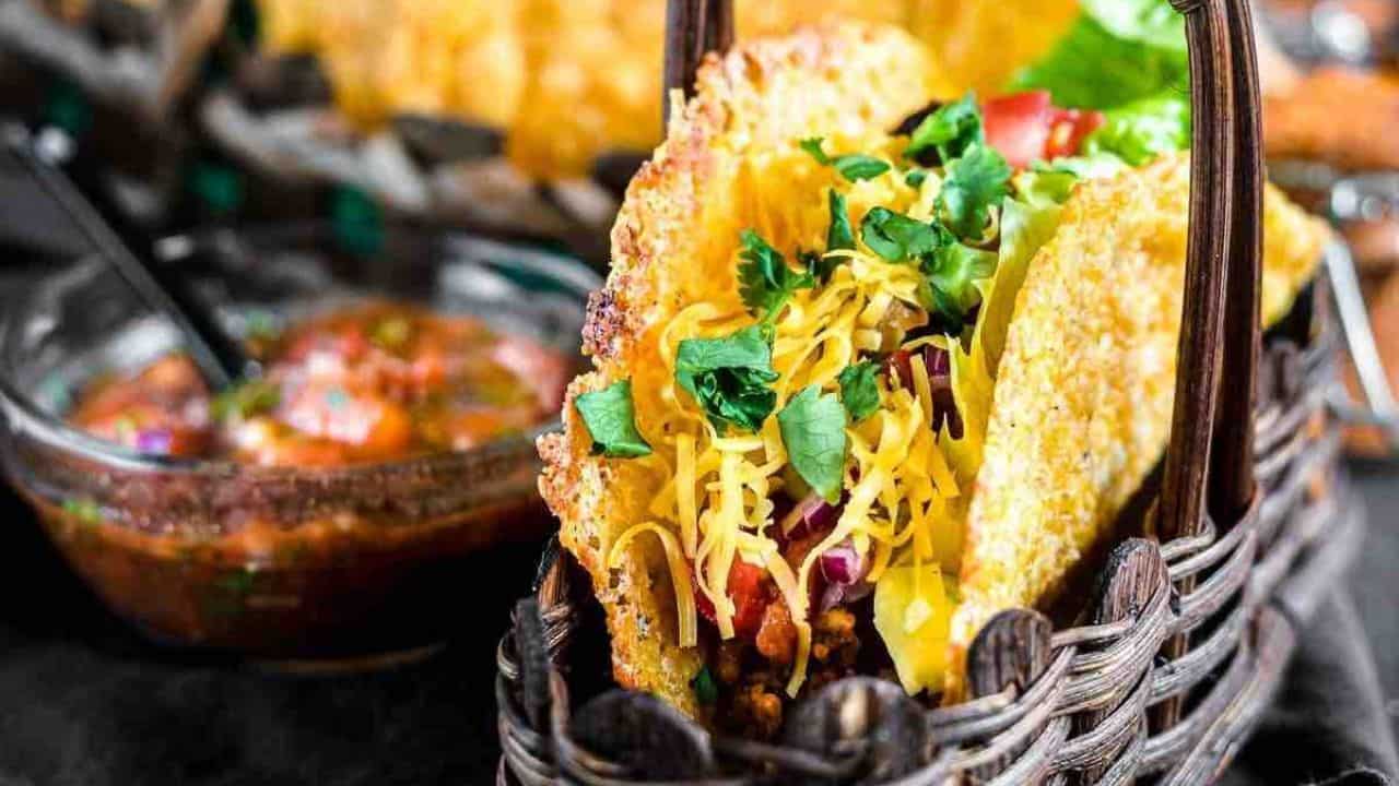 Tacos in a brown basket.