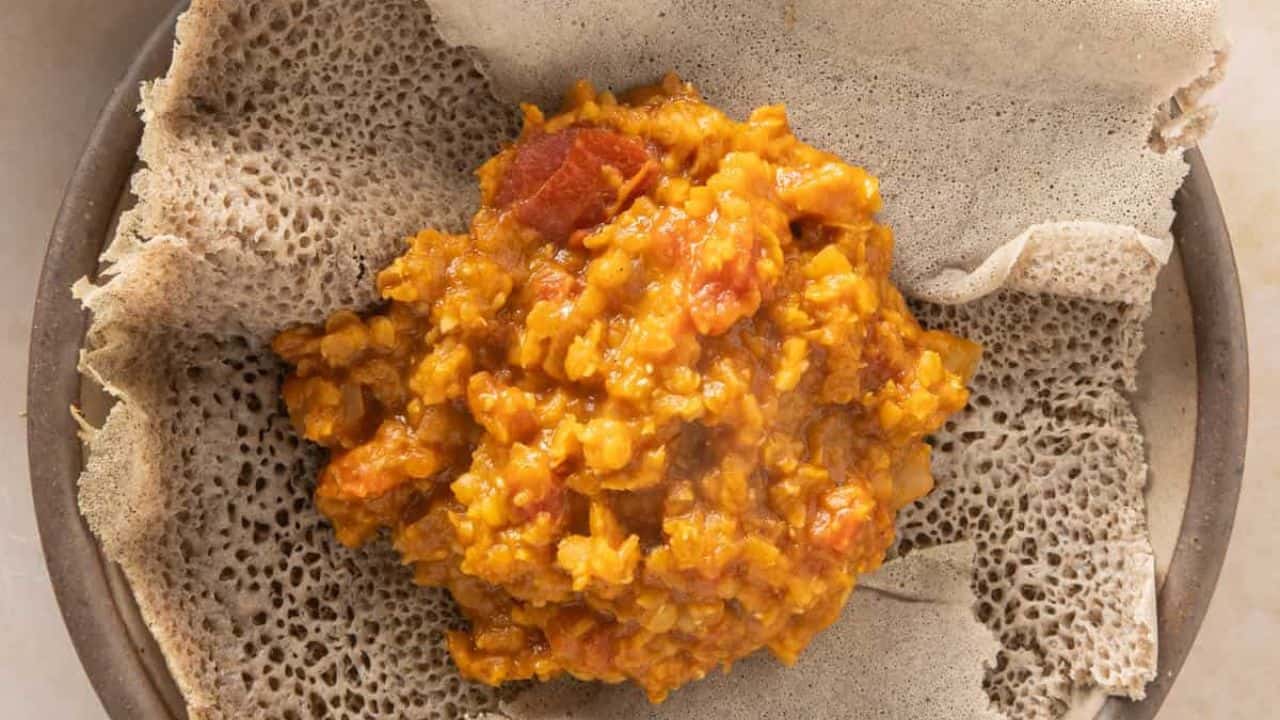 A close-up of a plate featuring misir wot.