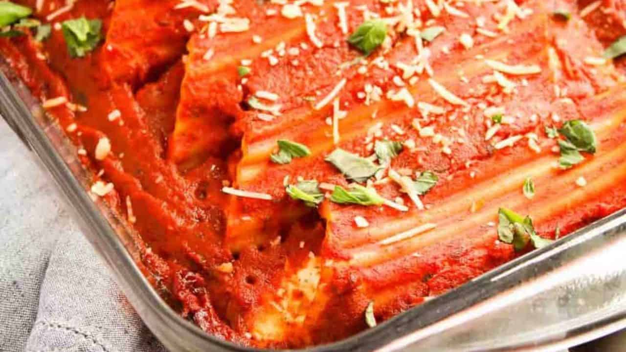 Pasta baked in a dish with sauce.