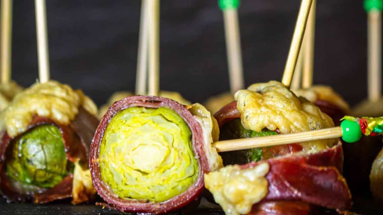 Bacon Wrapped Brussels Sprouts cut into half.