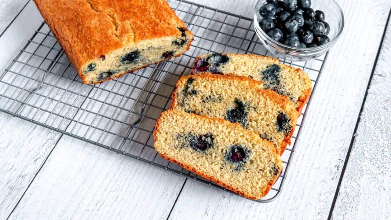 Blueberry bread on a cooling rack.
