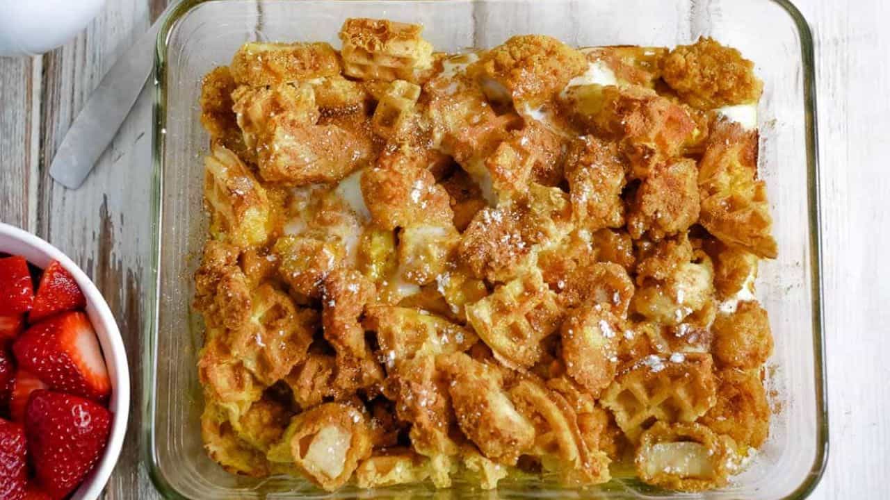 Piece of chicken and waffle casserole on a plate.