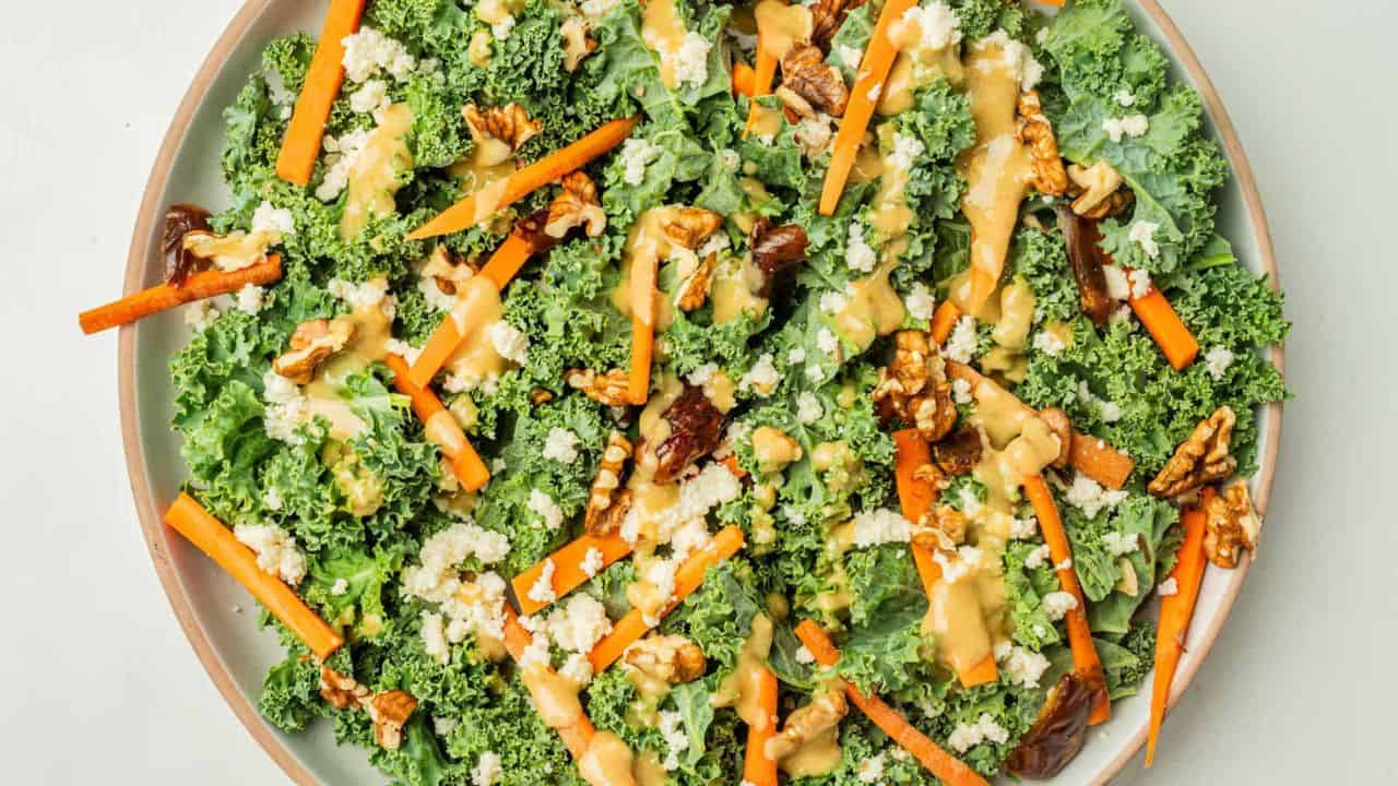 An overhead image of kale salad in a large serving bowl.