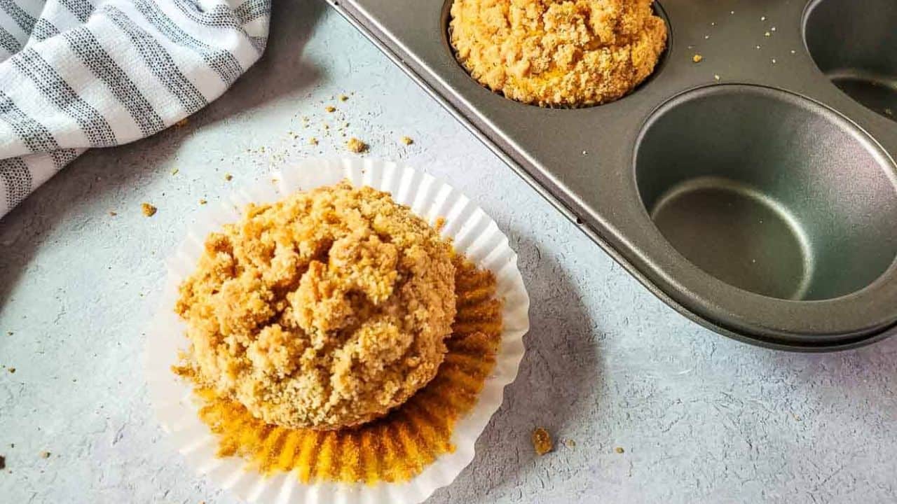 Pumpkin muffin topped with streusel.