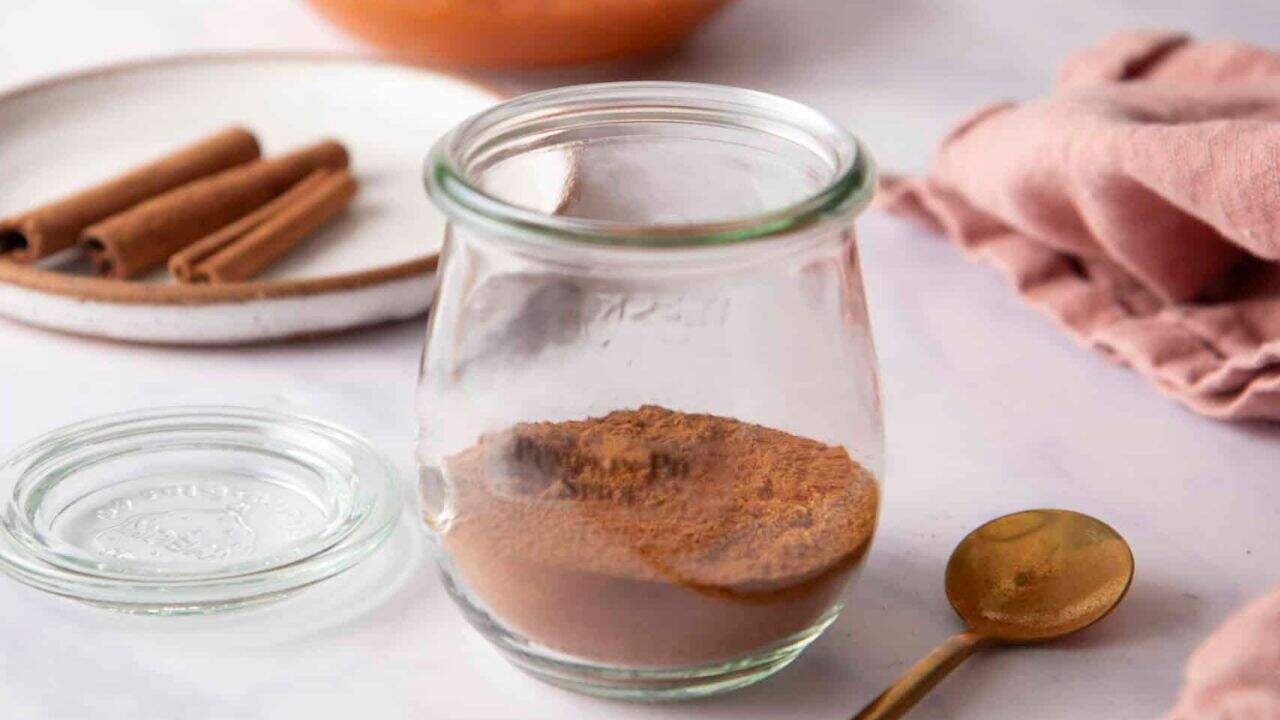 An image of pumpkin pie spice blend in a jar.