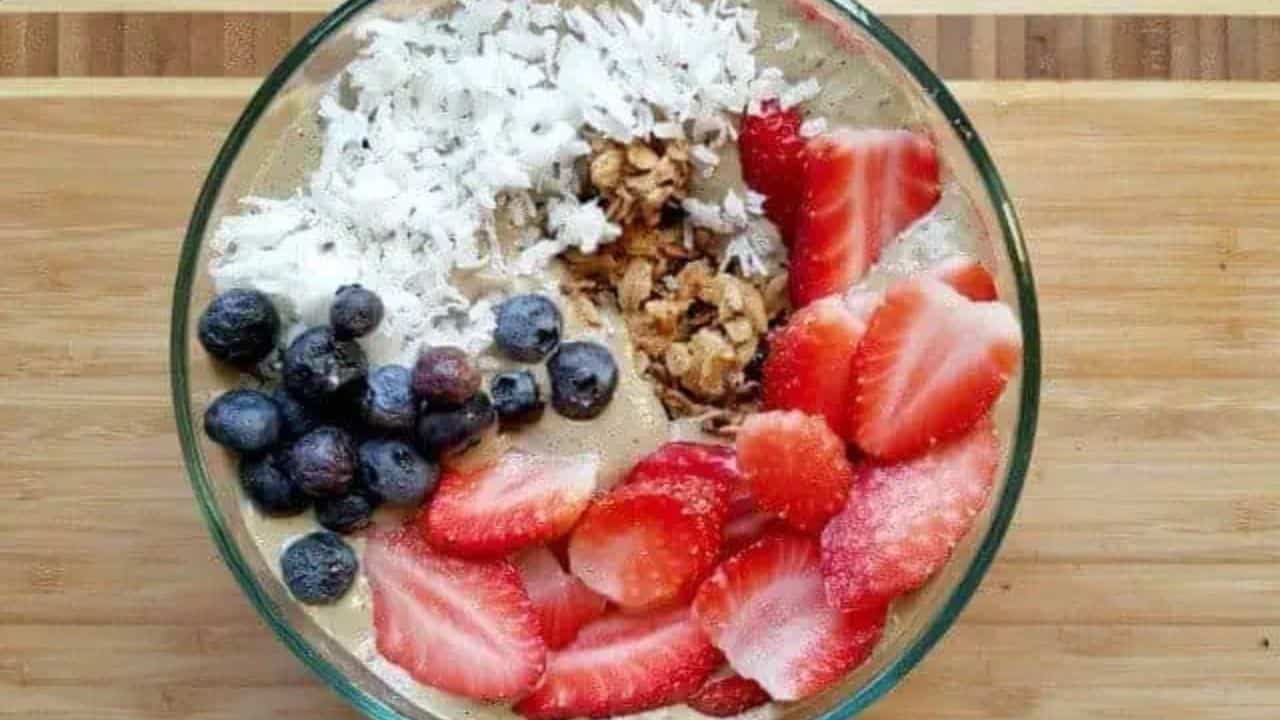 Image shows banana Chocolate chip muffins in a muffin tin.