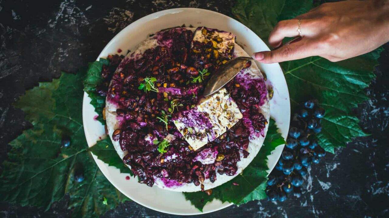 Side view of rice with feta on top.