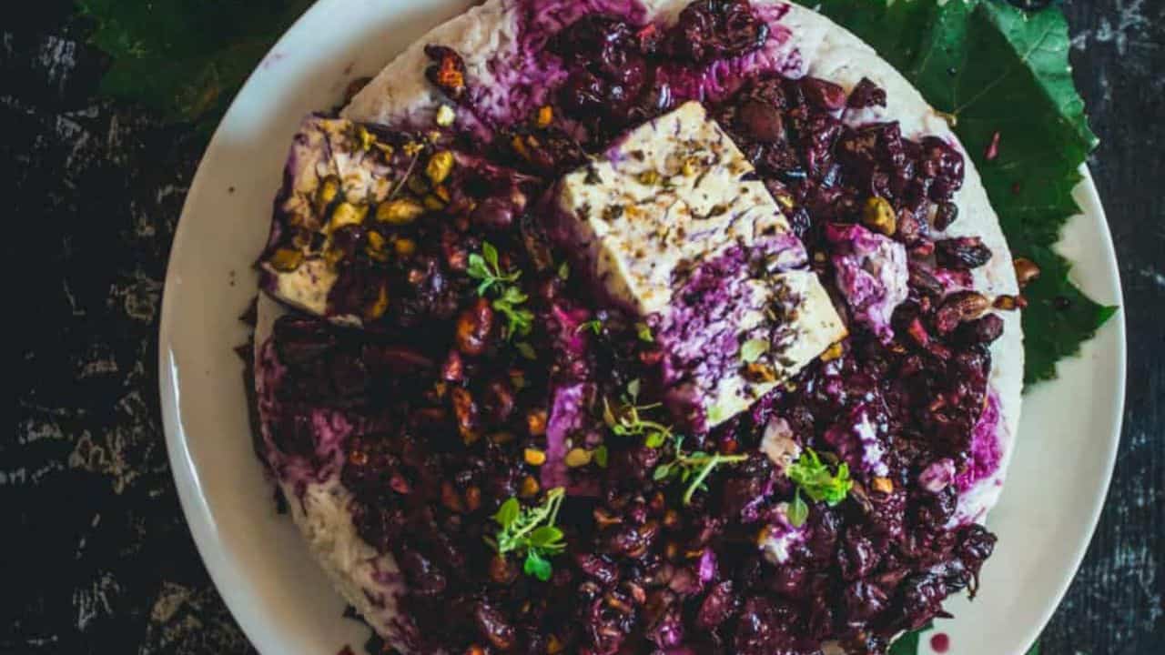 Side view of rice with feta on top.