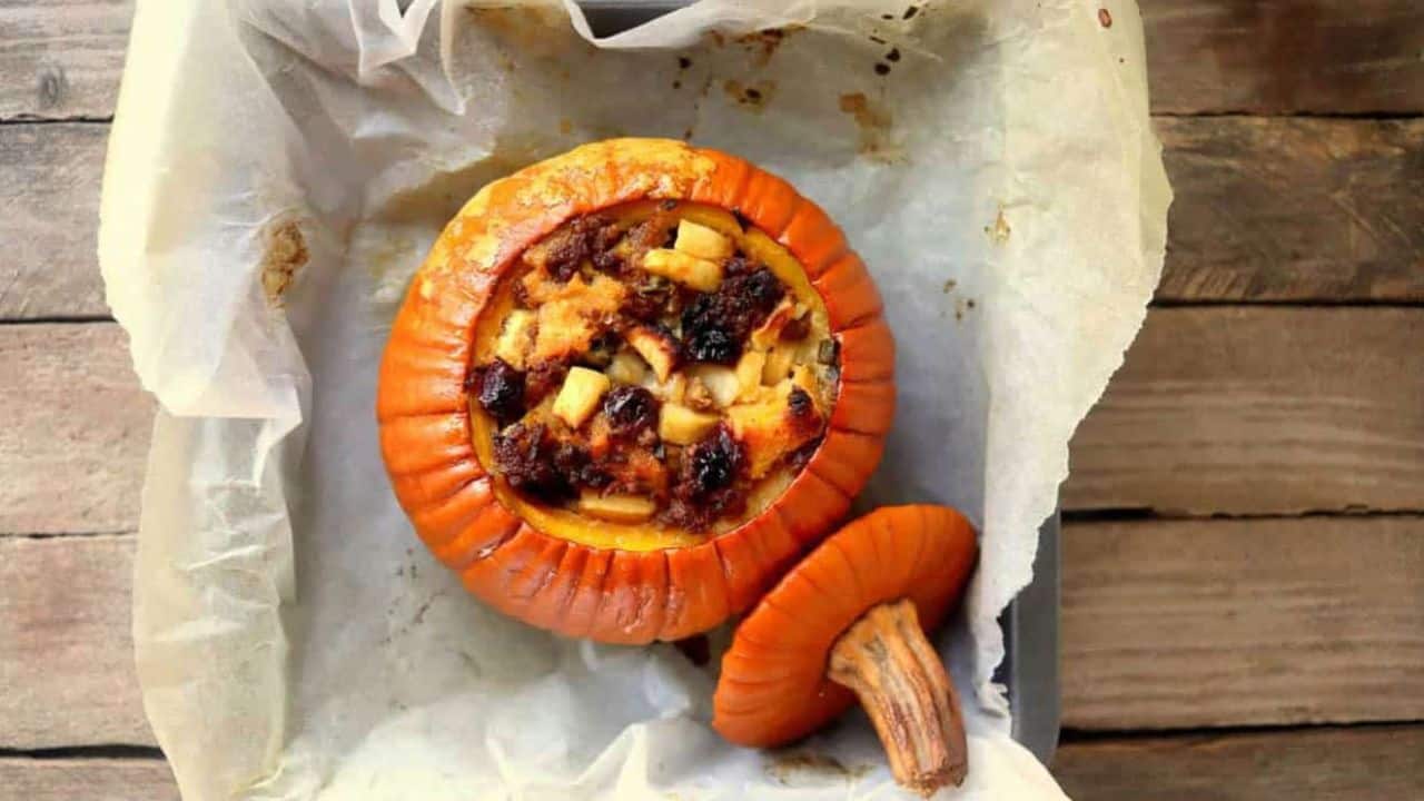 A pumpkin stuffed and bakked in a pan.