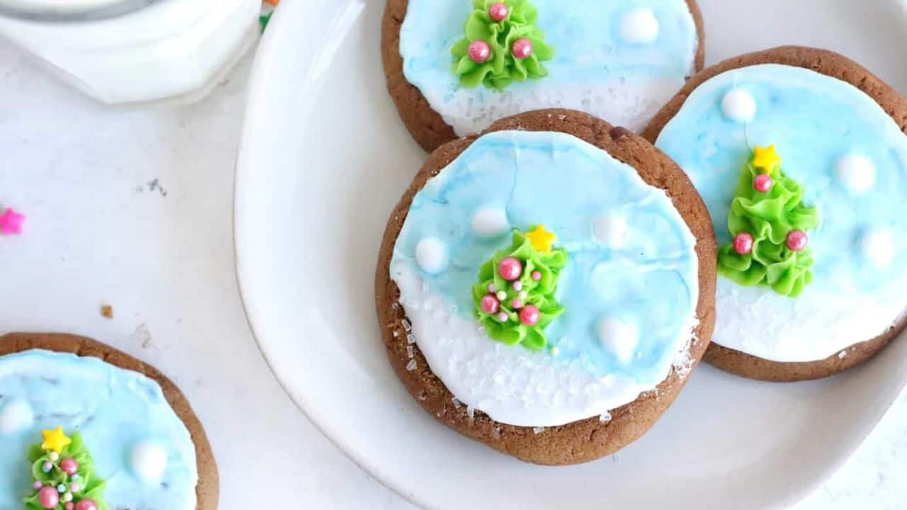 Air fried gingerbread cookies decorated for the holidays with icing and sprinkles.