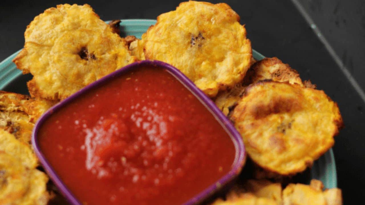 Plate of tostones and salsa.