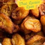 A glass bowl filled with fried plantains sits on a wooden surface. Text overlay highlights popular Bahamas breakfast foods sure to delight your morning cravings.