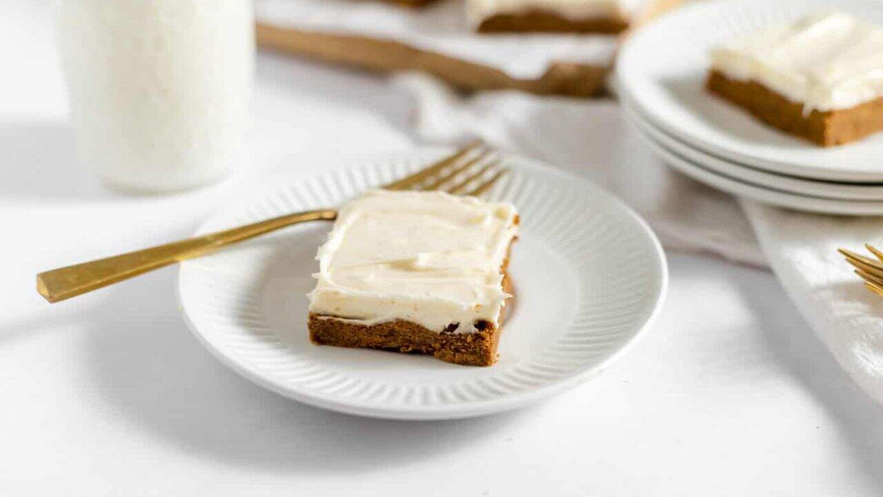 Gingerbread cookies topped with white icing.