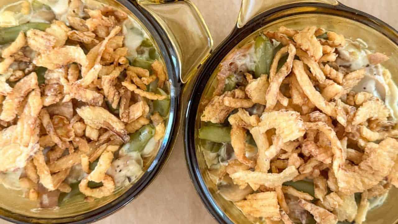 Crispy onions added to the casserole with a fork on the side.