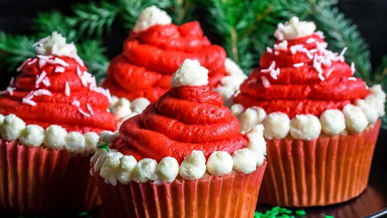 Santa Hats Cupcakes on a plate.