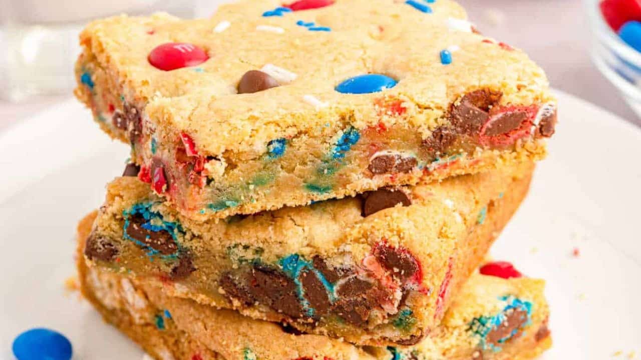 M&M sugar cookie bars cut into squares.