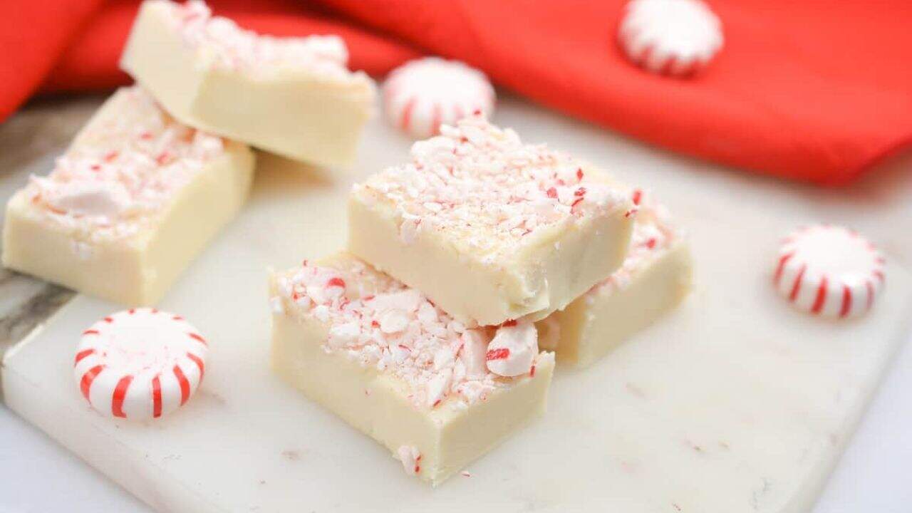 Peppermint fudge on a cutting board.