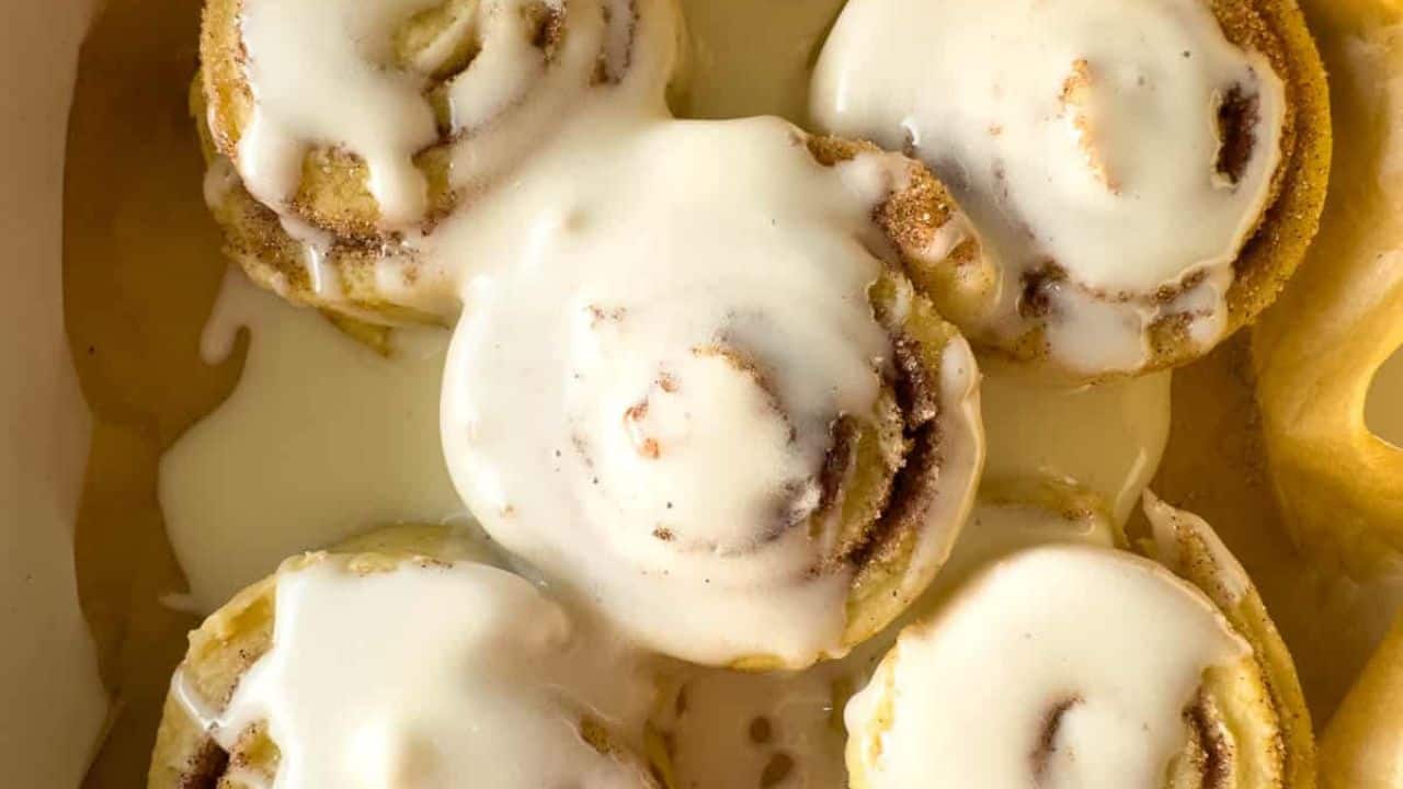 A pan of little spiral pie crust cookies.