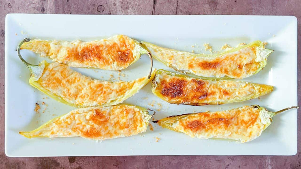 Plates of stuffed banana peppers.