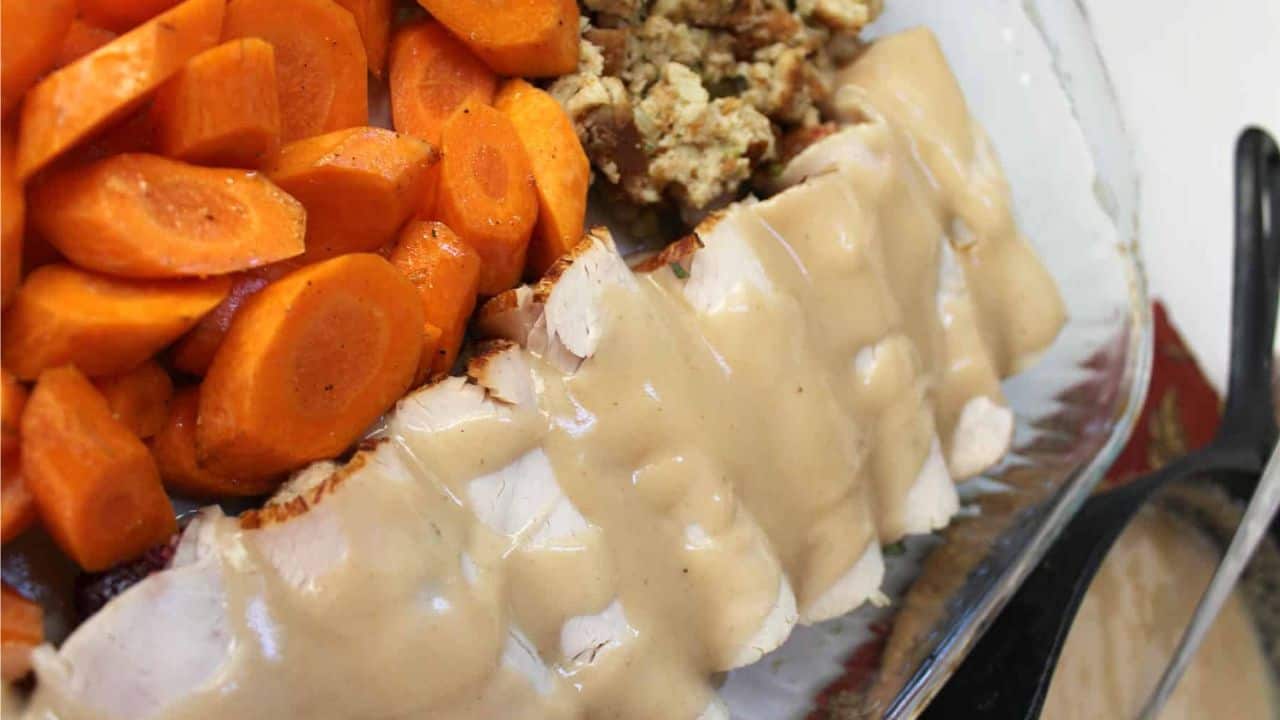 Turkey rolls with stuffing and cooked carrots.