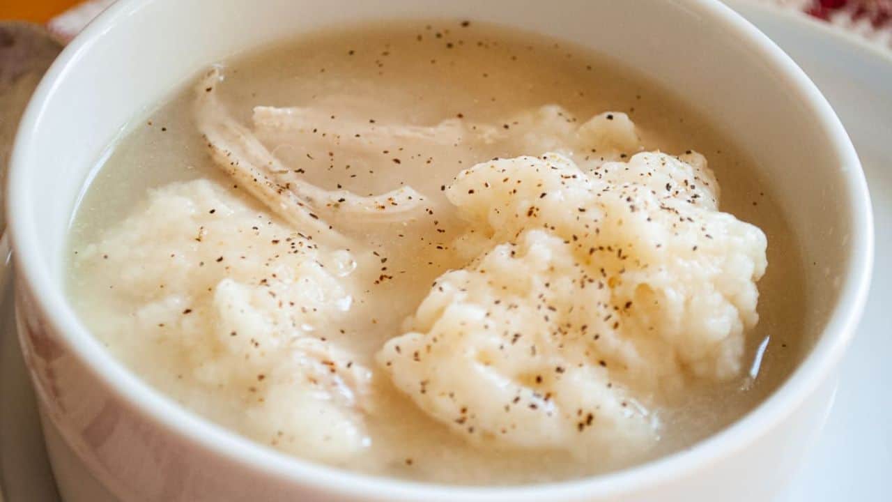 2 bowls of soup with homemade dumplings.