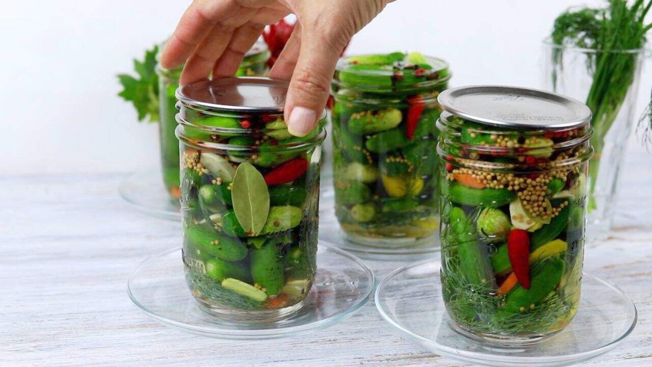 Homemade Fermented Dill Keto Pickles in a mason jars.